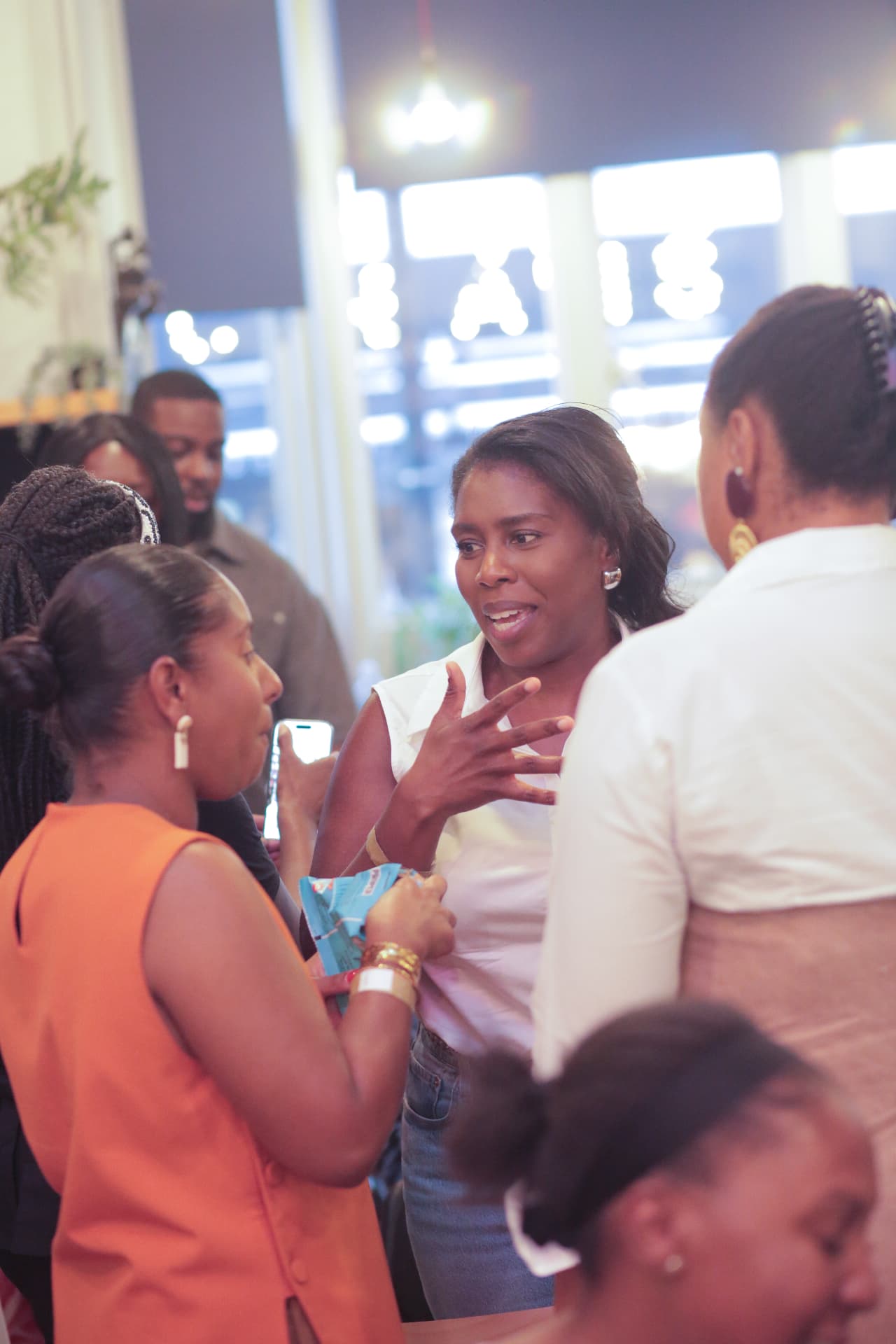 Guests in conversation after the panel discussion